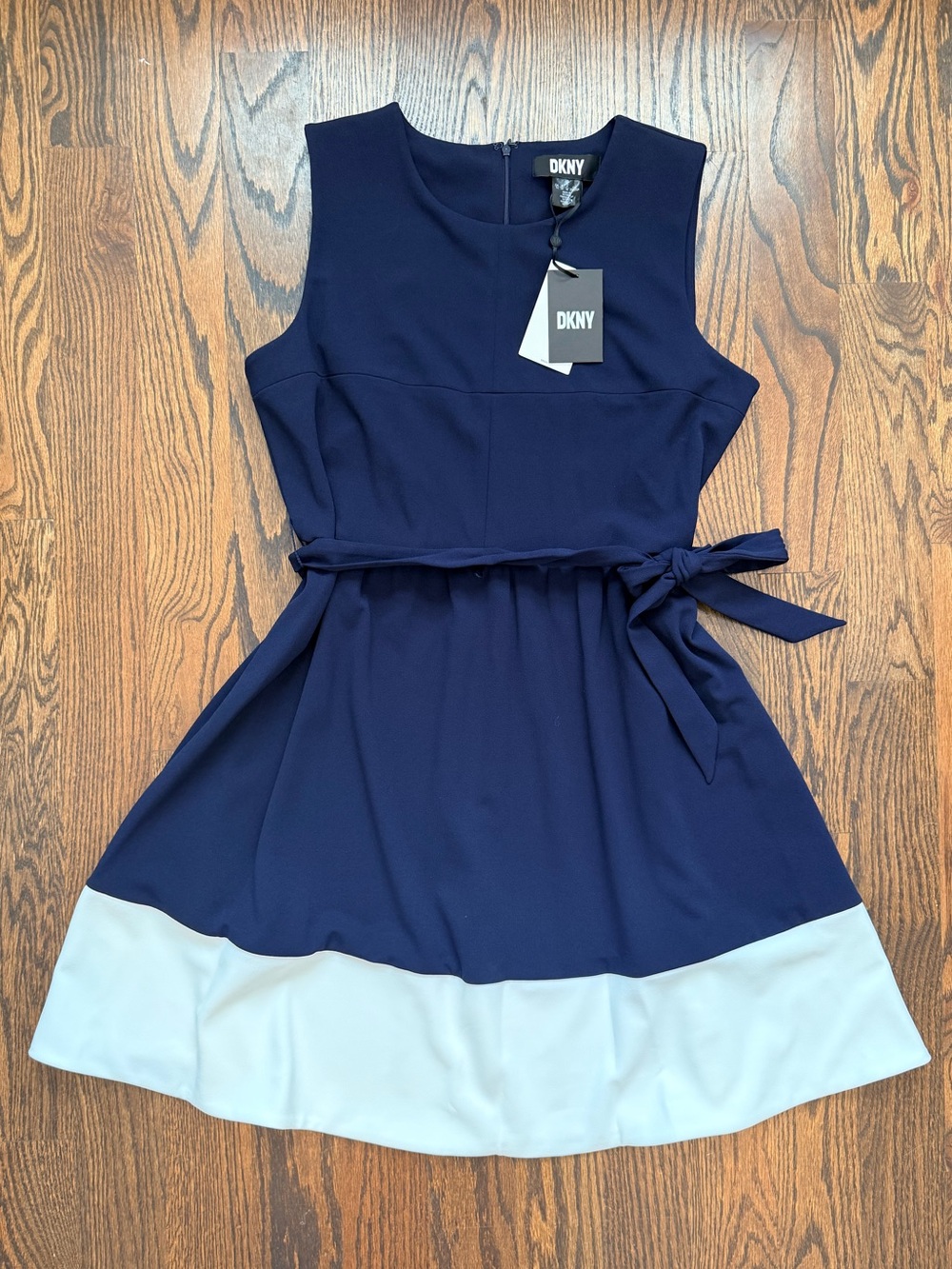 NWT DKNY dress. Navy with white color block bottom. High quality. Fits nice!
